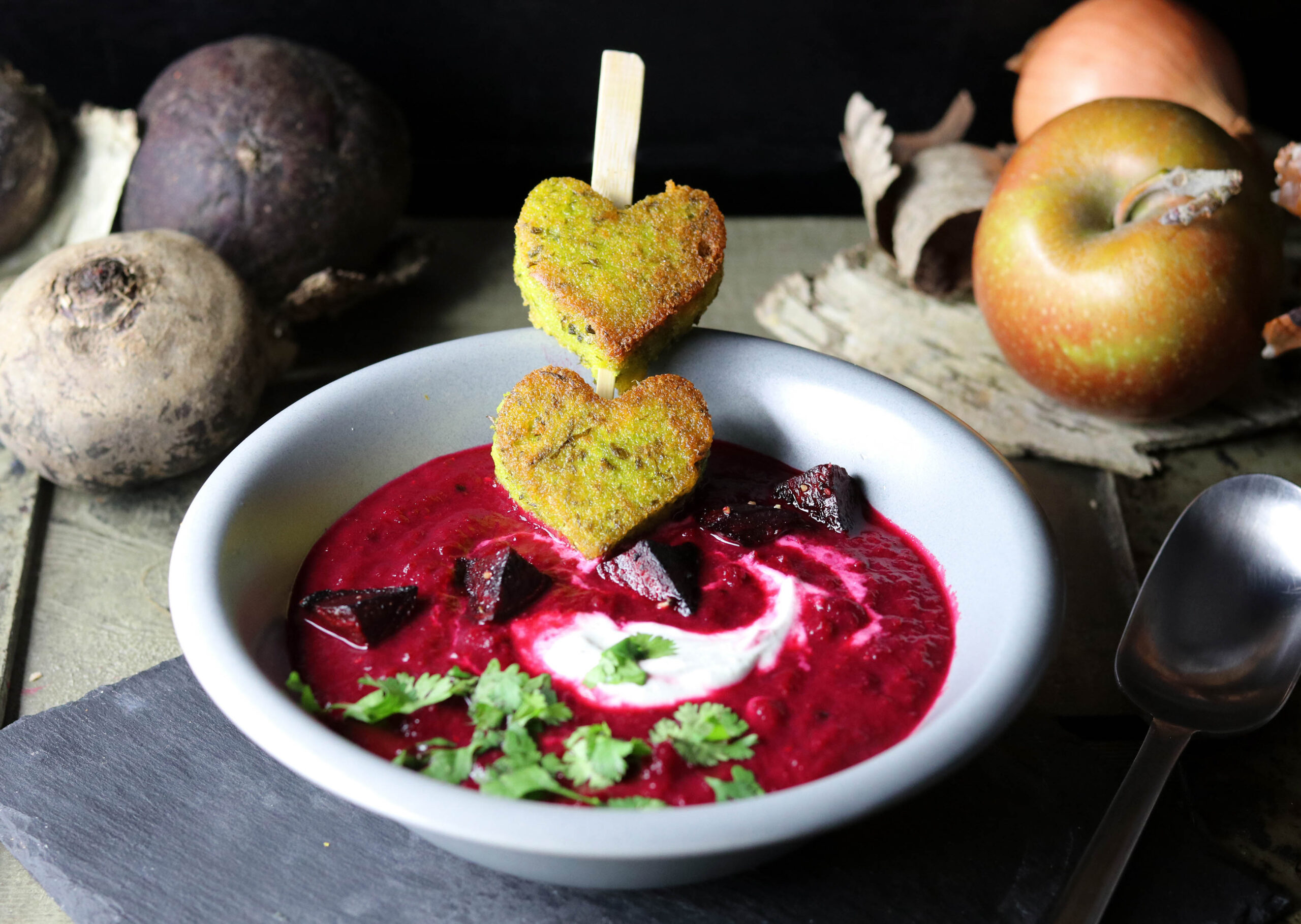 Beetroot apple soup with light crème, cilantro and green polenta hearts