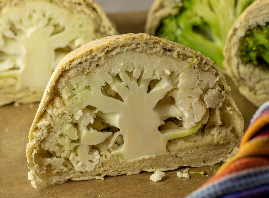 Cauliflower or broccoli baked in herbal dough on red wine shallots