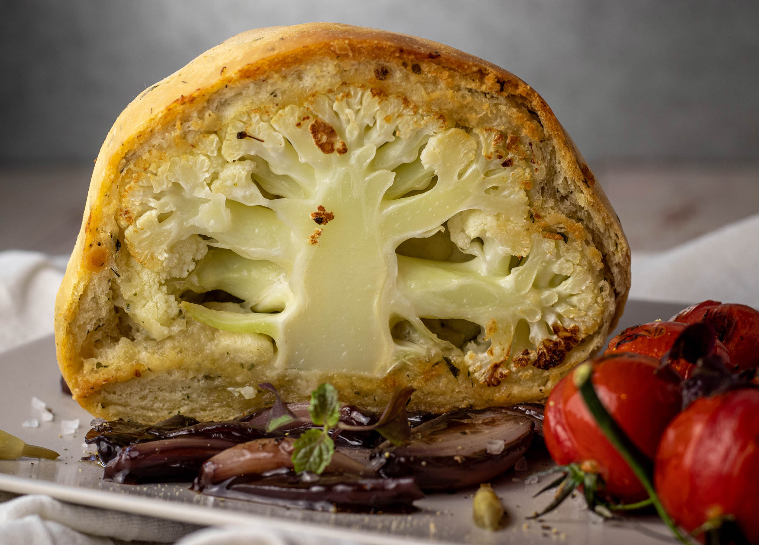 Cauliflower or broccoli baked in herbal dough on red wine shallots