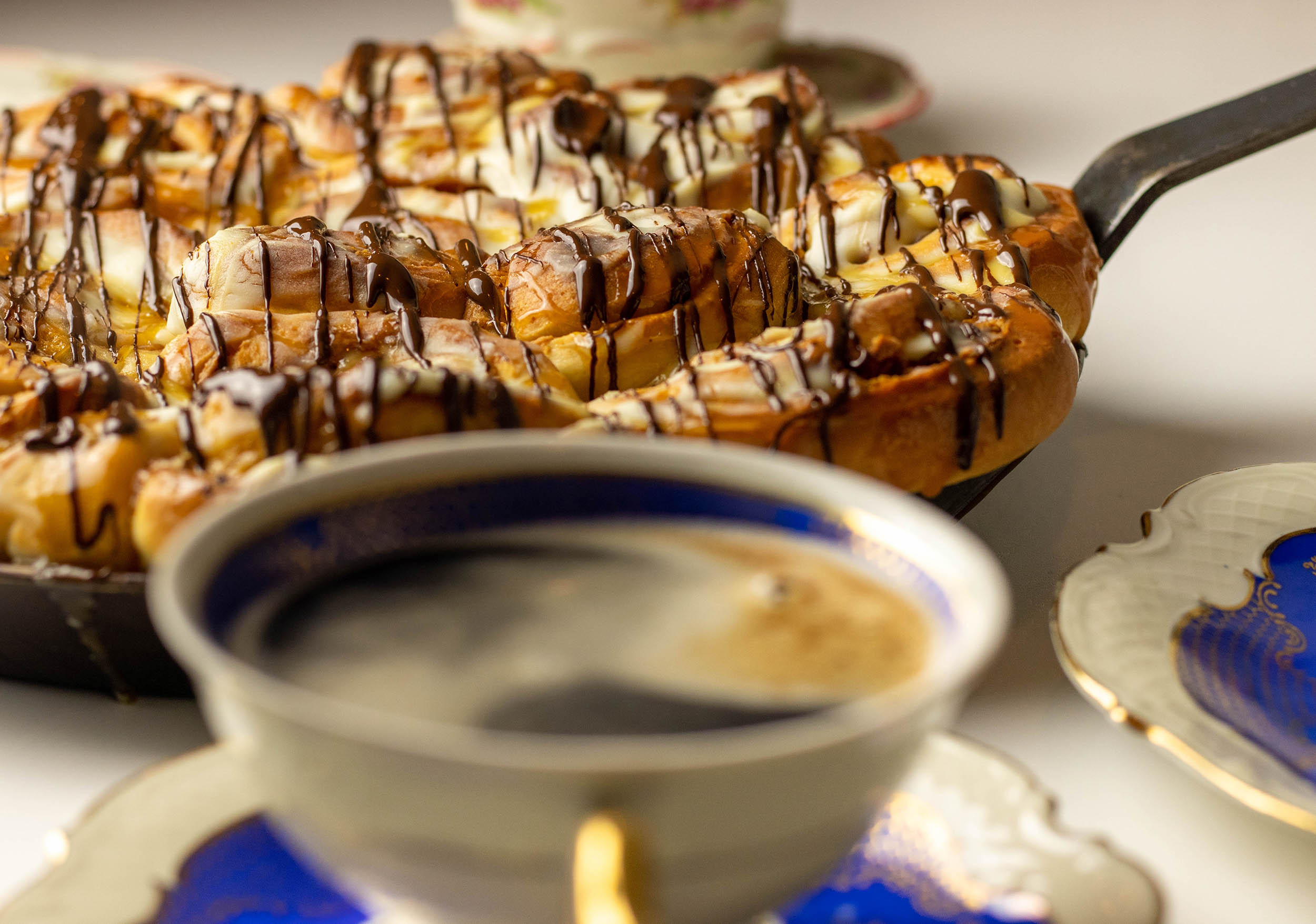 Peanut butter and salted caramel rolls with cream cheese frosting