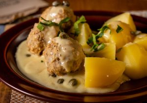 Königsberger Klopse are a traditional meatball dish, with a slightly fishy note