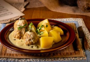 These hearty meatballs come with a special aromatic, creamy caper sauce