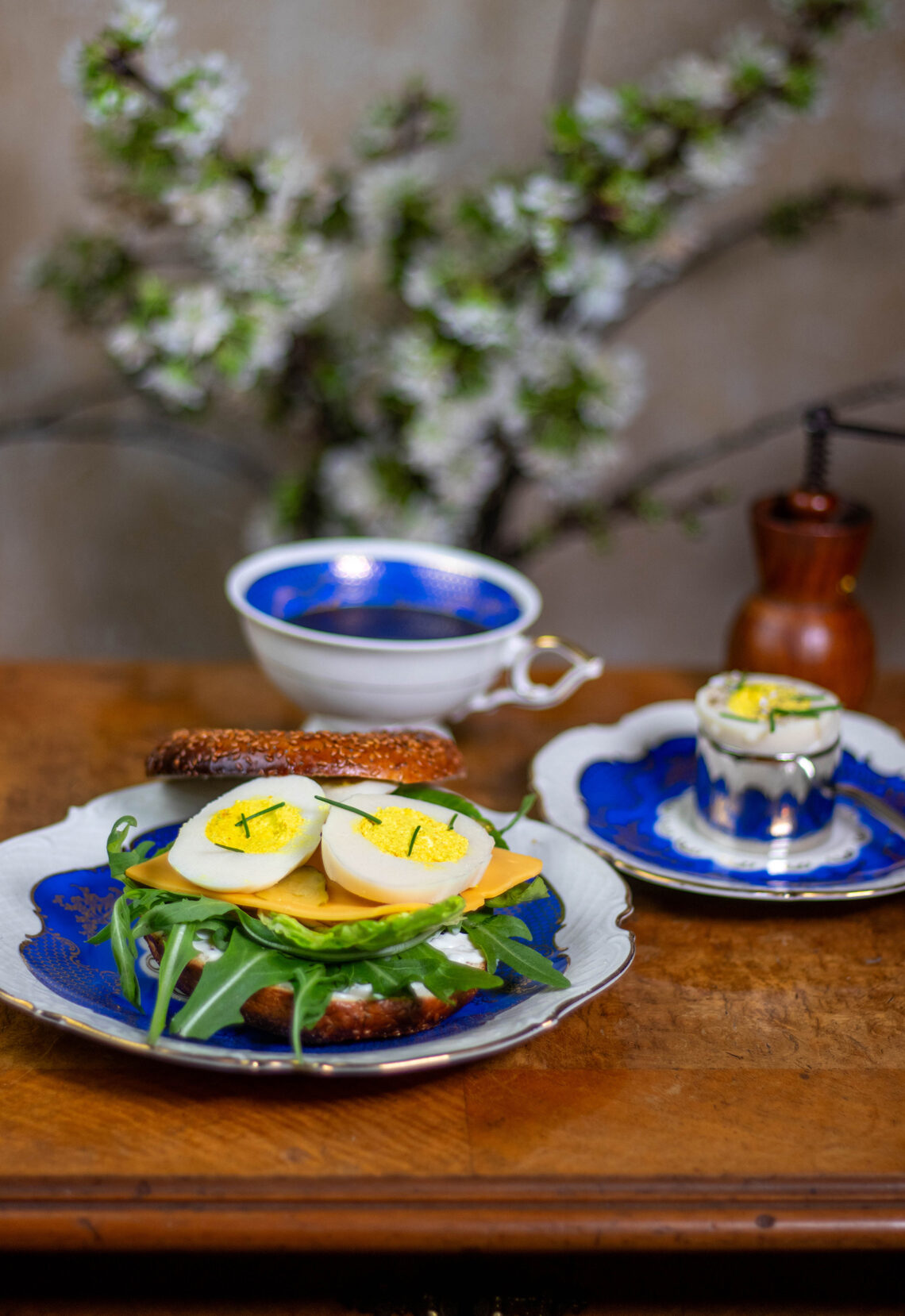 Vegan hard-boiled eggs on a bagel and as a breakfast egg.