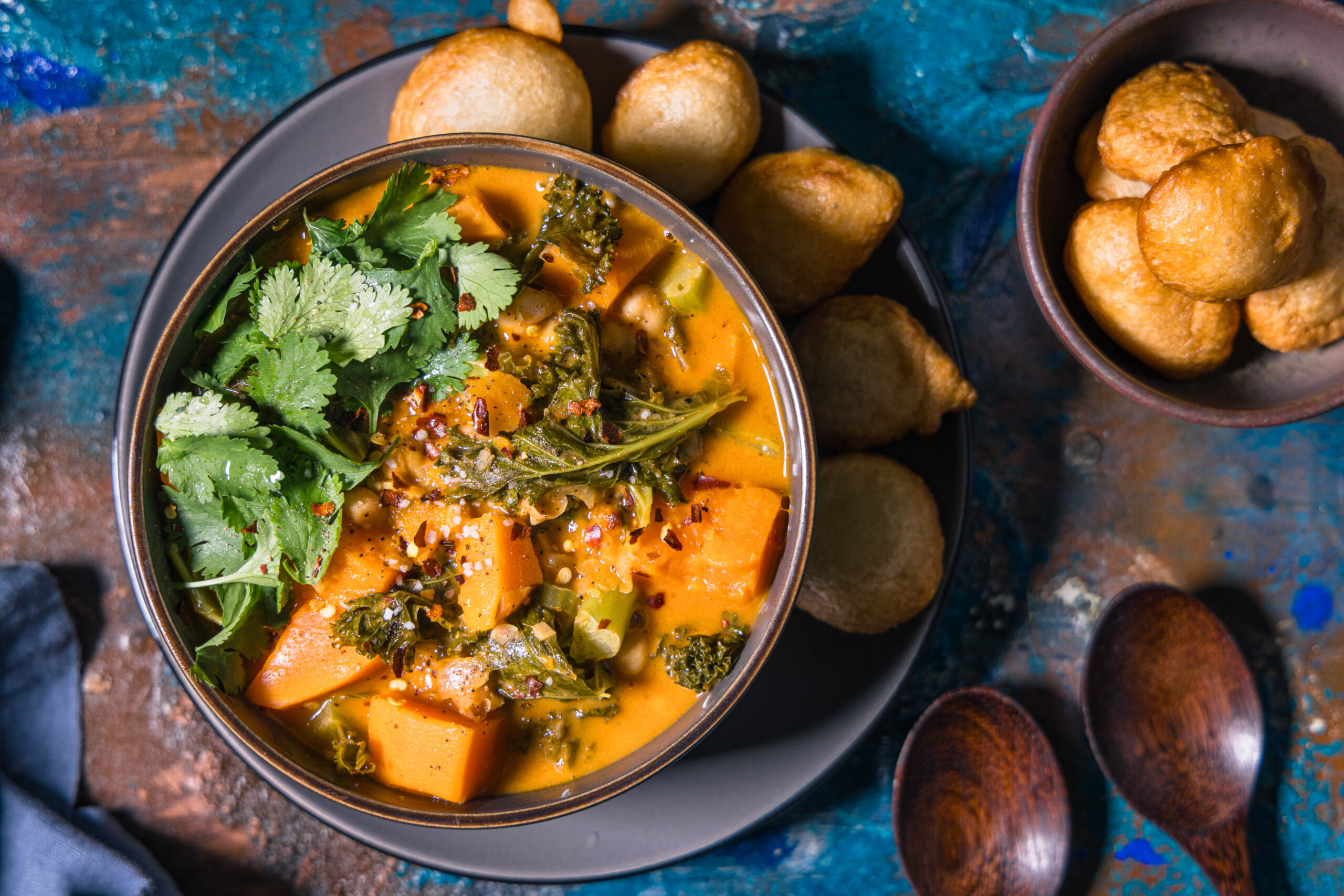 West African peanut stew with puff puffs