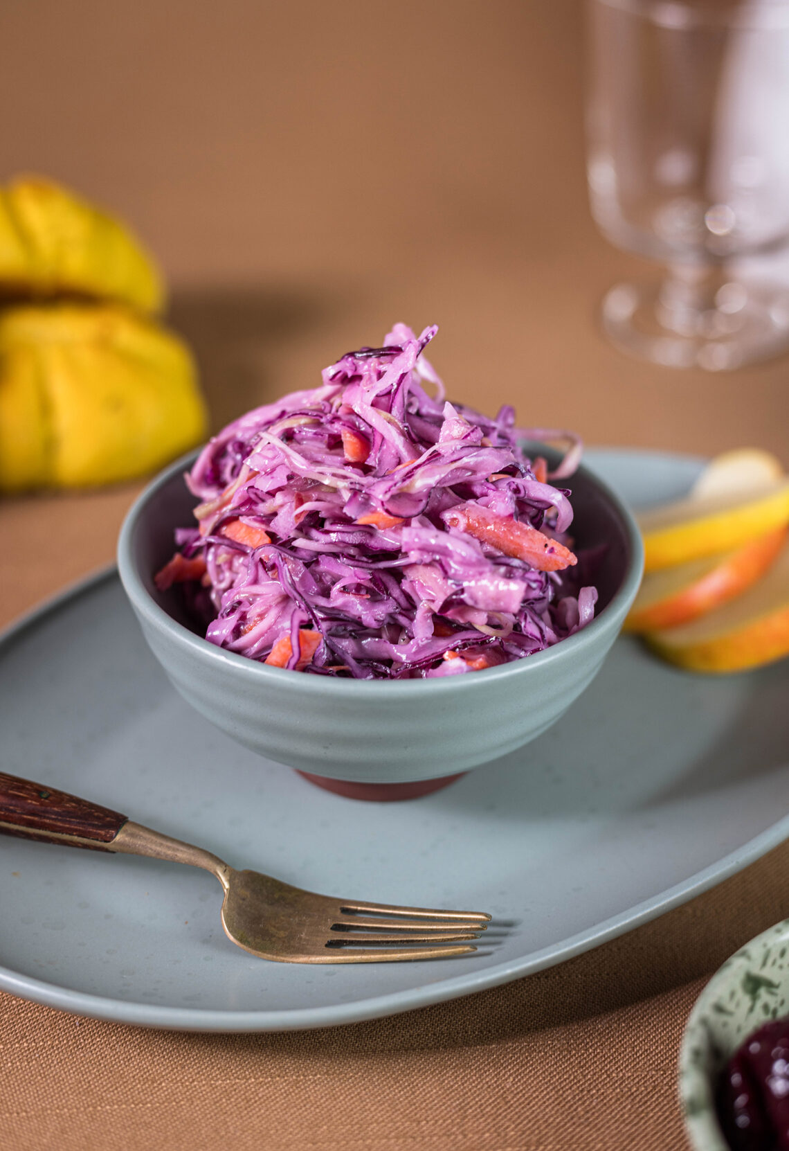 Coleslaw – creamy and crunchy cabbage salad with red and white cabbage in a mint green bowl